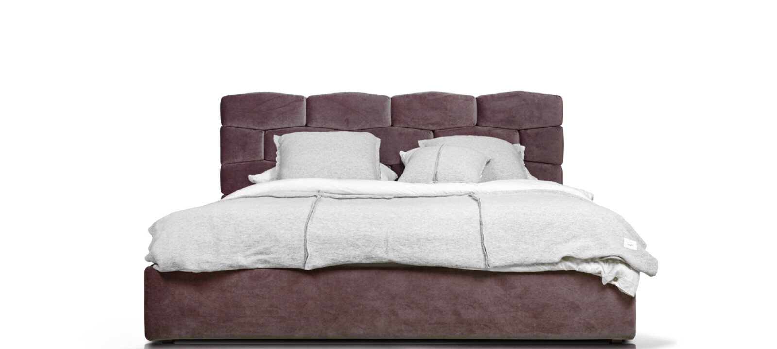 Łóżko tapicerowane czy drewniane — wady i zalety obu mebli