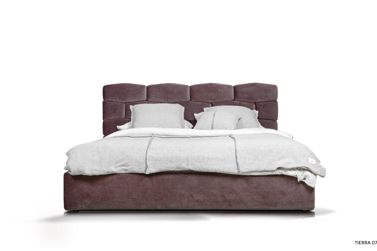 Łóżko tapicerowane czy drewniane — wady i zalety obu mebli